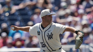 Tyrus Hall drives in four, WVU outlasts Troy, 7-5, in College World Series Opener